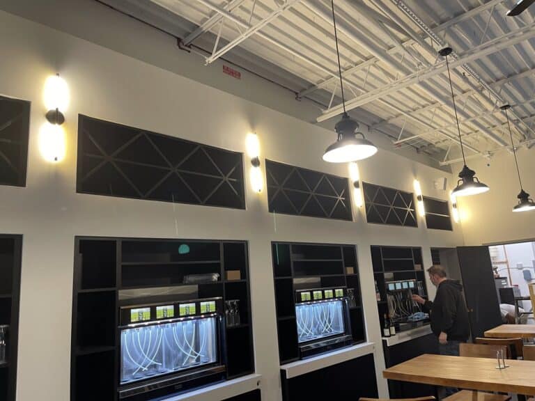 Oliver's Bistro (EN-US) 12 Enomatic wine dispensing wall at TASTE Wine Bar & Market in Atlanta